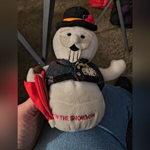 Festive Snowman Plush with Black Vest and Red Scarf